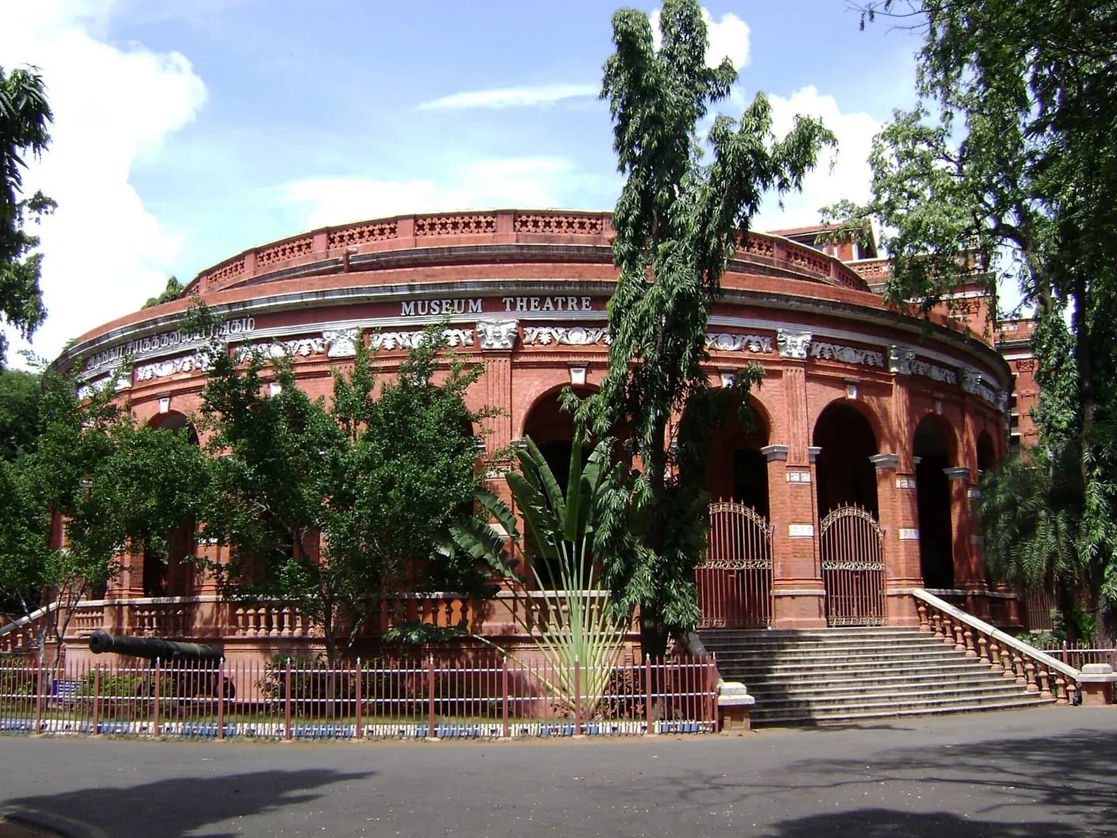 The circular red-brick facade of the Museum Theatre in Chennai