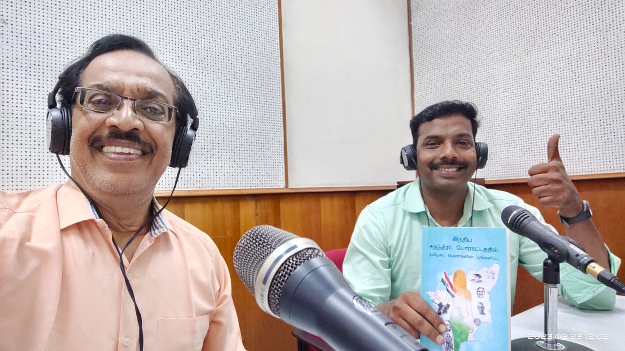 Recording a talk at an All India Radio microphone