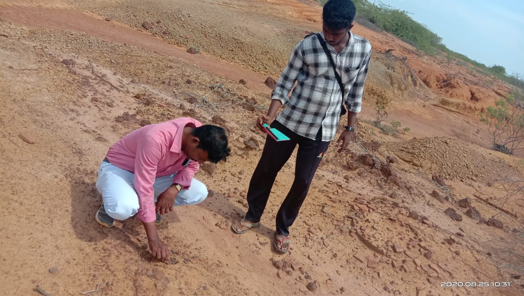 Excavating a trench at a field site